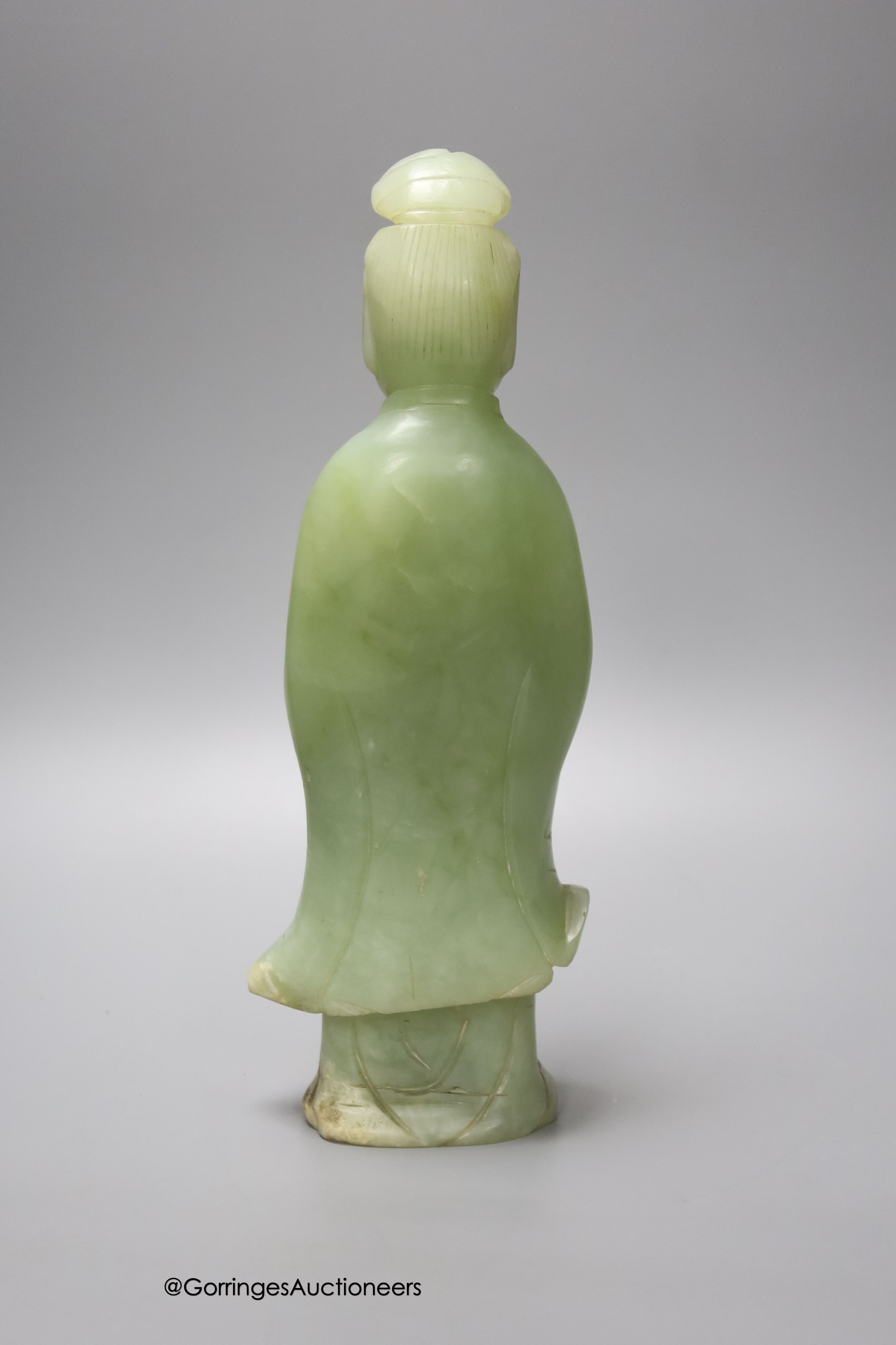 A Chinese green hardstone figure of Guanyin, 29cm